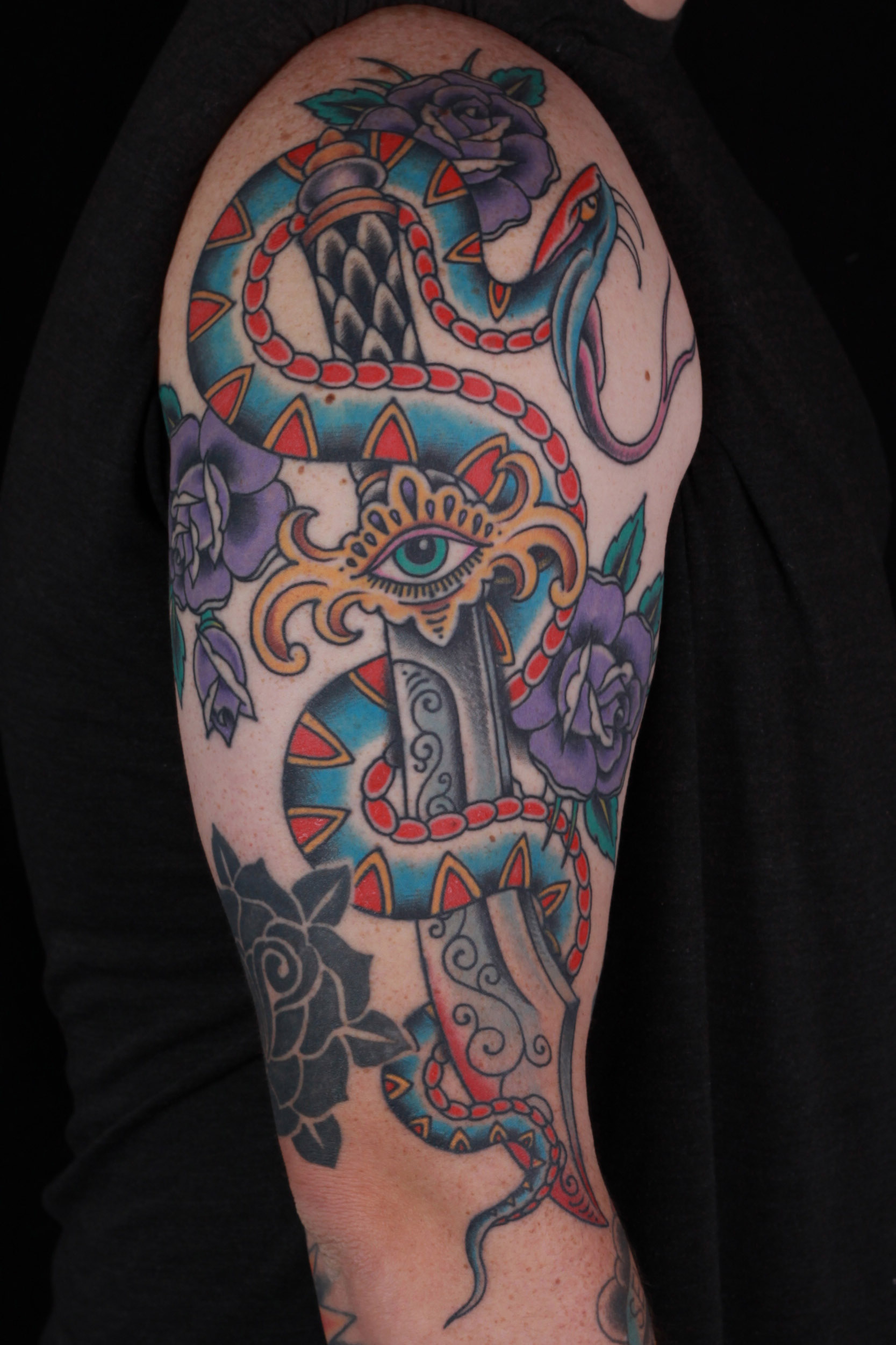 brian-thurow-dedication-tattoo-traditional-arm-snake-dagger-roses