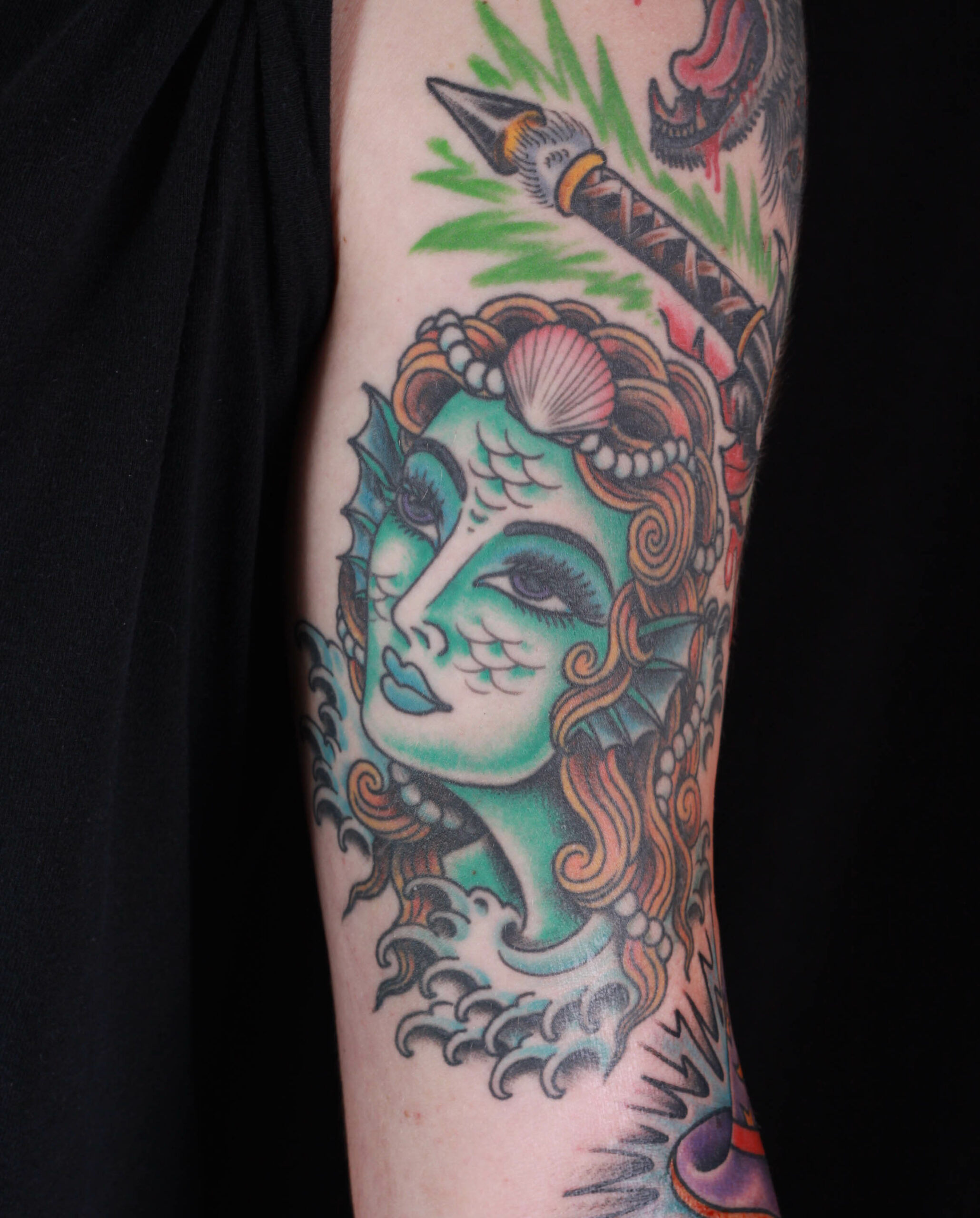 brian-thurow-dedication-tattoo-mermaid-girl-waves-forearm