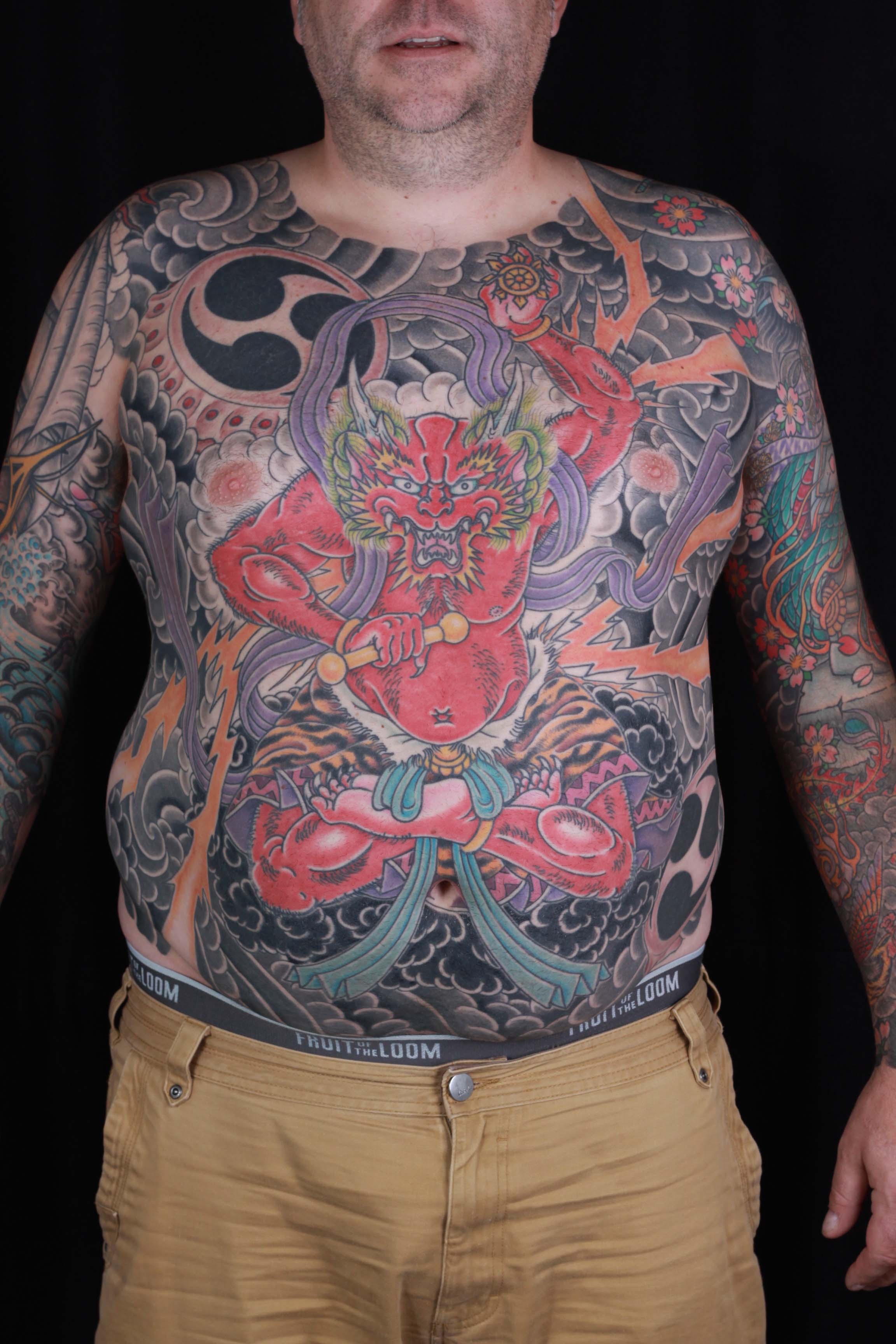 brian-thurow-dedication-tattoo-raijin-japanese-stomach-chest-lightning-god-front