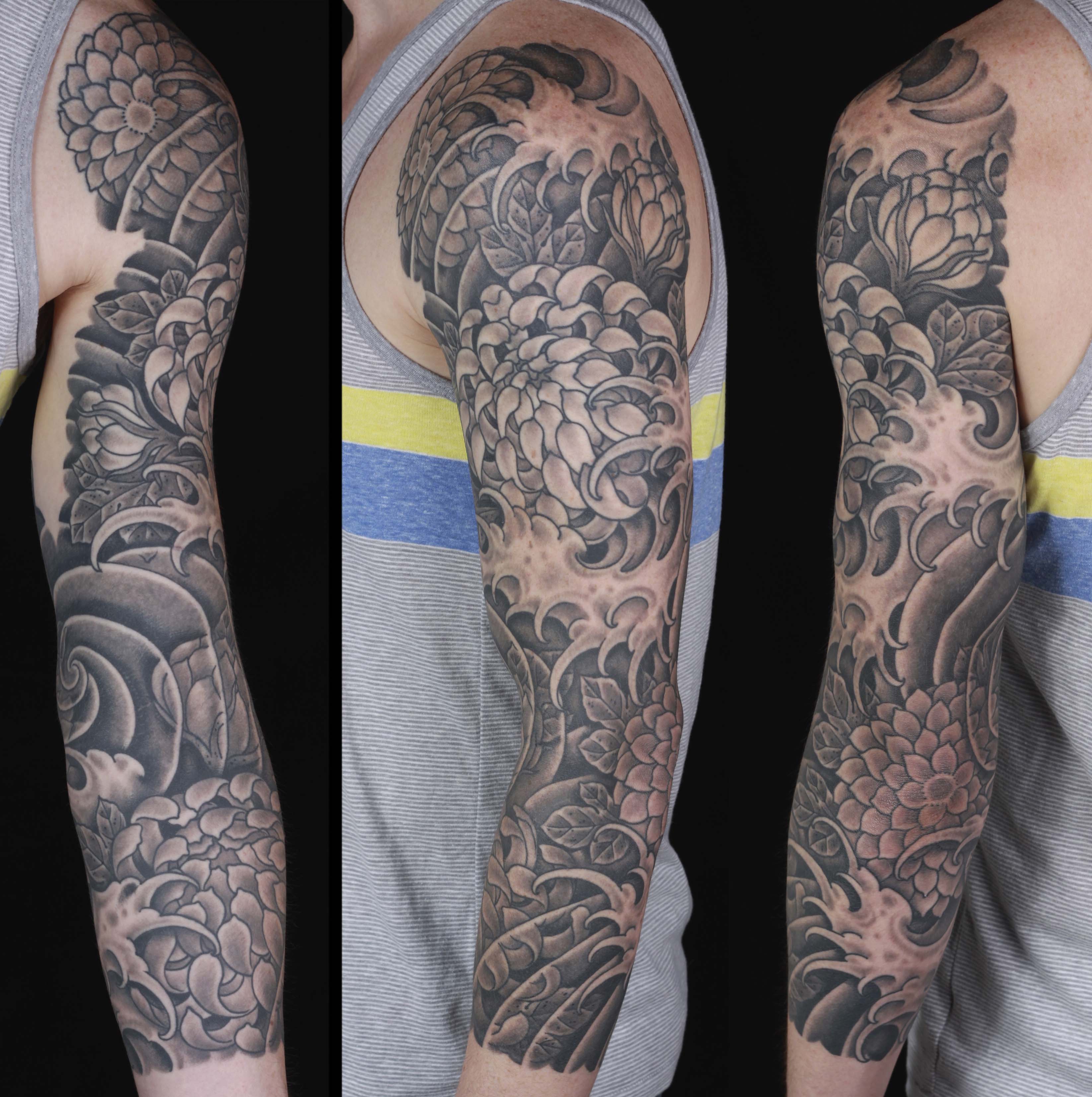 brian-thurow-dedication-tattoo-black-and-grey-japanese-chrysanthemum-water-waces-sleeve-arm