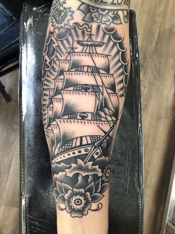 traditional style ship tattoo
