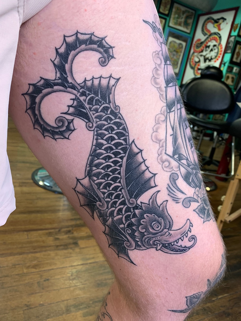 Ancient sea monster tattooed in the American Traditional style. Made at Denver's finest Dedication Tattoo.