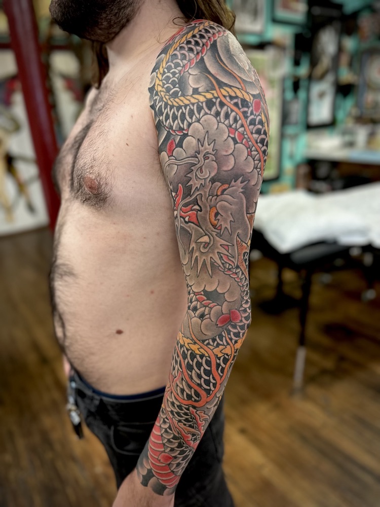 Dragon sleeve tattooed in the Japanese Traditional style. Made at Denver's finest Dedication Tattoo.