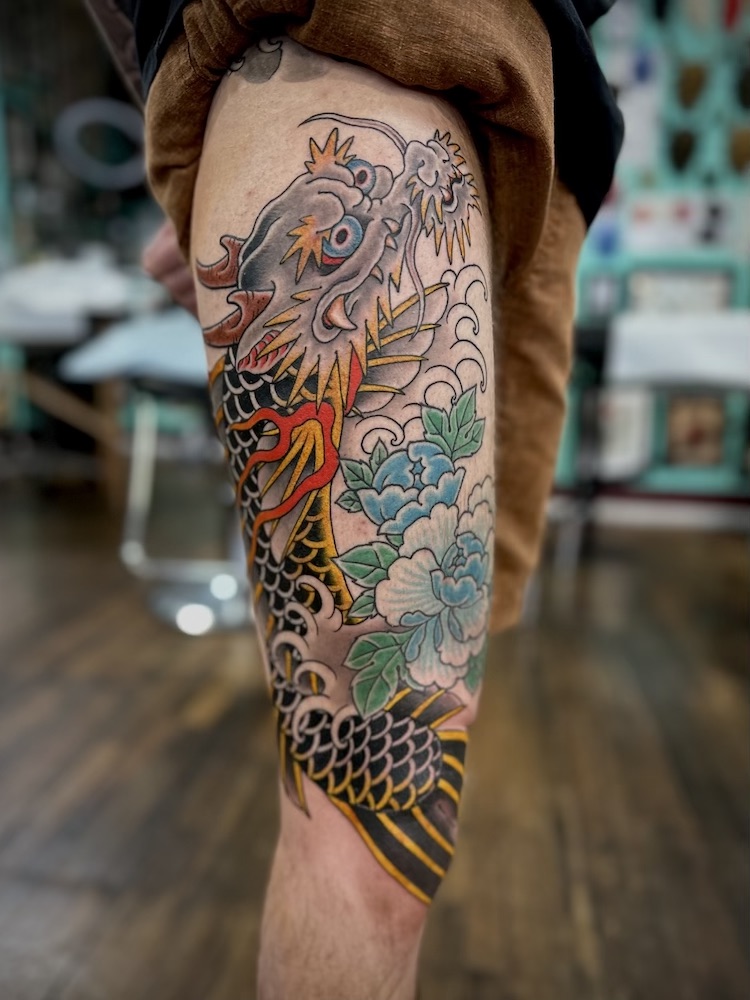 Koi Dragon tattooed in the Japanese Traditional style. Made at Denver's finest Dedication Tattoo.