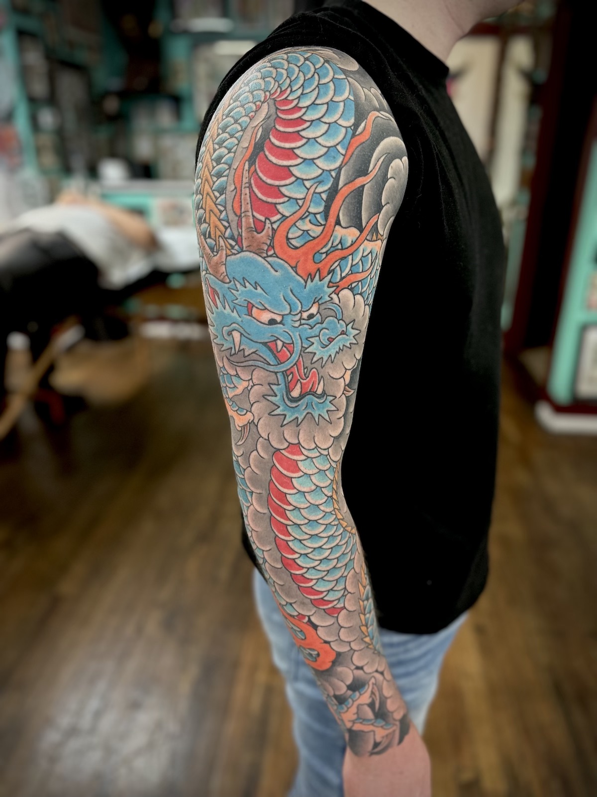 Dragon sleeve tattooed in the Japanese Traditional style. Made at Denver's finest Dedication Tattoo.