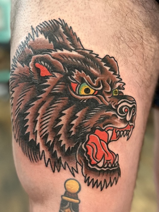 Fierce bear tattooed in the American Traditional style. Made at Denver's finest Dedication Tattoo.