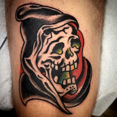 Reaper tattooed in the American Traditional style. Made at Denver's finest Dedication Tattoo.